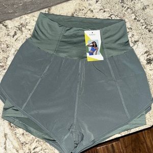 Halara Super High Waisted Curved Hem 2-in-1 Side Pocket Shorts 2.5''